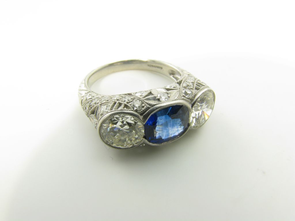 Women's TIFFANY exquisite Art Deco platinum, sapphire and diamond ring.