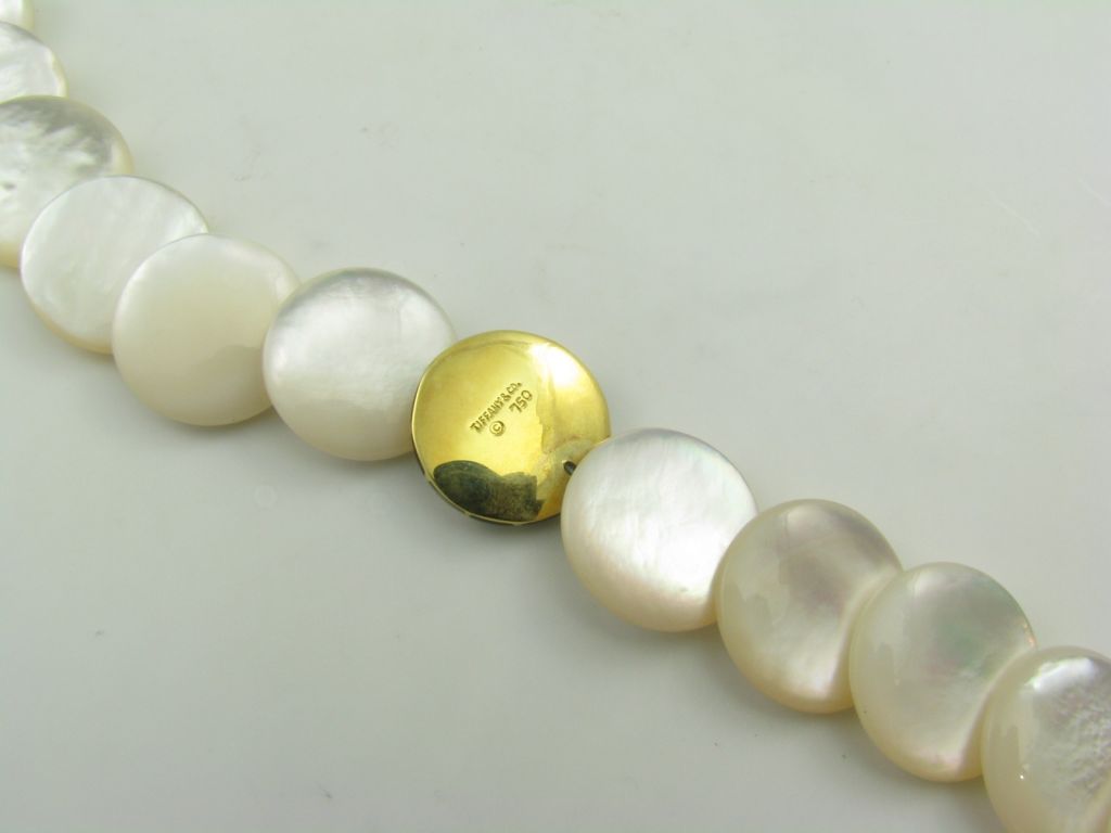 Women's TIFFANY & CO. stylish mother of pearl, onyx and gold necklace.