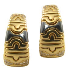 BULGARI classic gold, diamond and hematite "Parentesi" earrings.