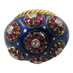 A stylish gold, enamel, ruby & diamond bombe style ring.