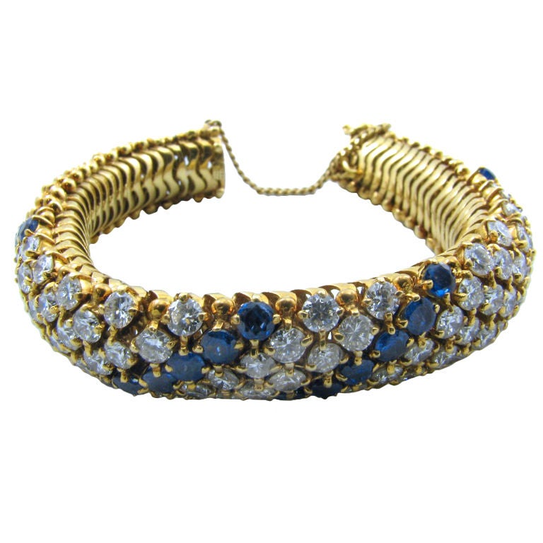 A chic gold, sapphire and diamond "cous cous" style bracelet.