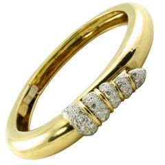 DONALD CLAFLIN/ TIFFANY stylish gold and diamond bangle bracelet