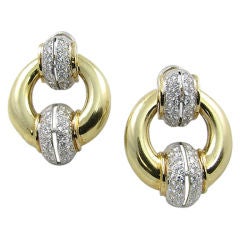 Retro A gorgeous pair of  pave diamond and gold door knocker earrings.