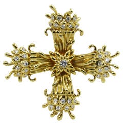 TIFFANY, SCHLUMBERGER chic diamond and gold cross brooch.