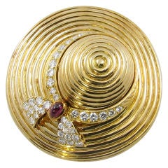 VAN CLEEF & ARPELS diamond, cabochon ruby and gold bonnet brooch