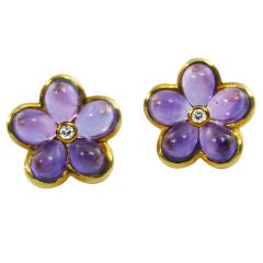 VAN CLEEF & ARPELS stylish amethyst & diamond flower earrings.
