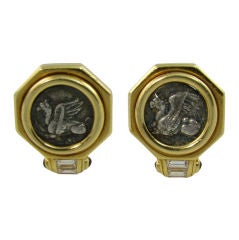 BULGARI classic gold bezel set coin earrings.