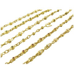 JEAN MAHIE  ruby, diamond, sapphire, emerald and gold chains