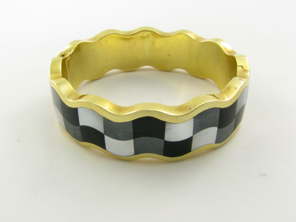 Women's TIFFANY & CO. gold, onyx, hematite and mother of pearl bracelet.