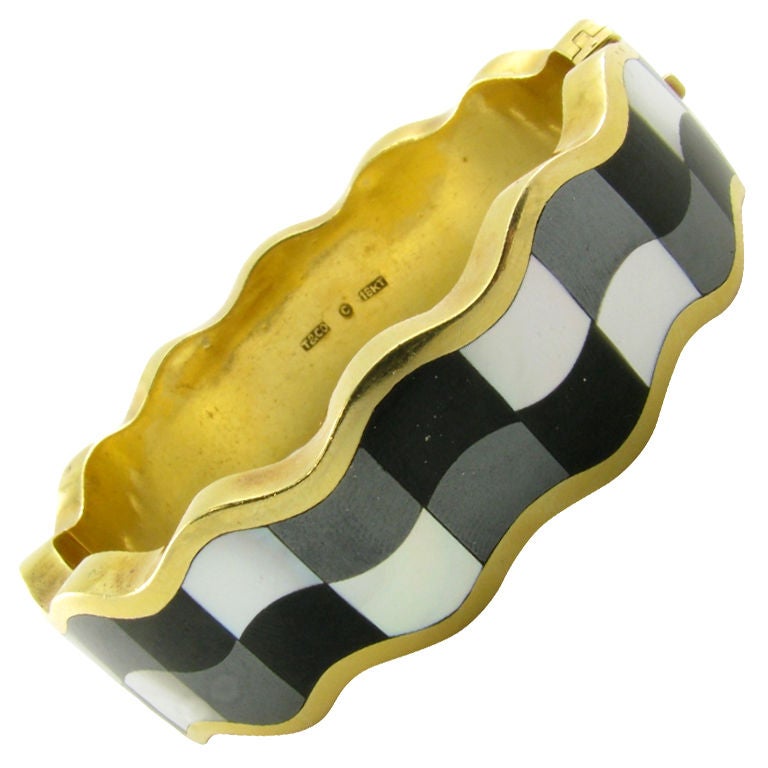 TIFFANY & CO. gold, onyx, hematite and mother of pearl bracelet.