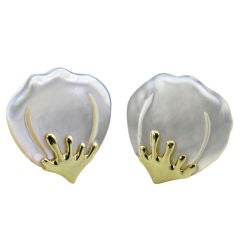 TIFFANY & CO. stylish pair of mother of pearl and gold earrings.