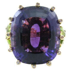 A fabulous amethyst, peridot and diamond cocktail ring.