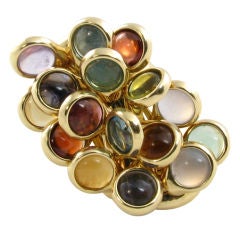 A fabulous yellow gold and colored stone ring.