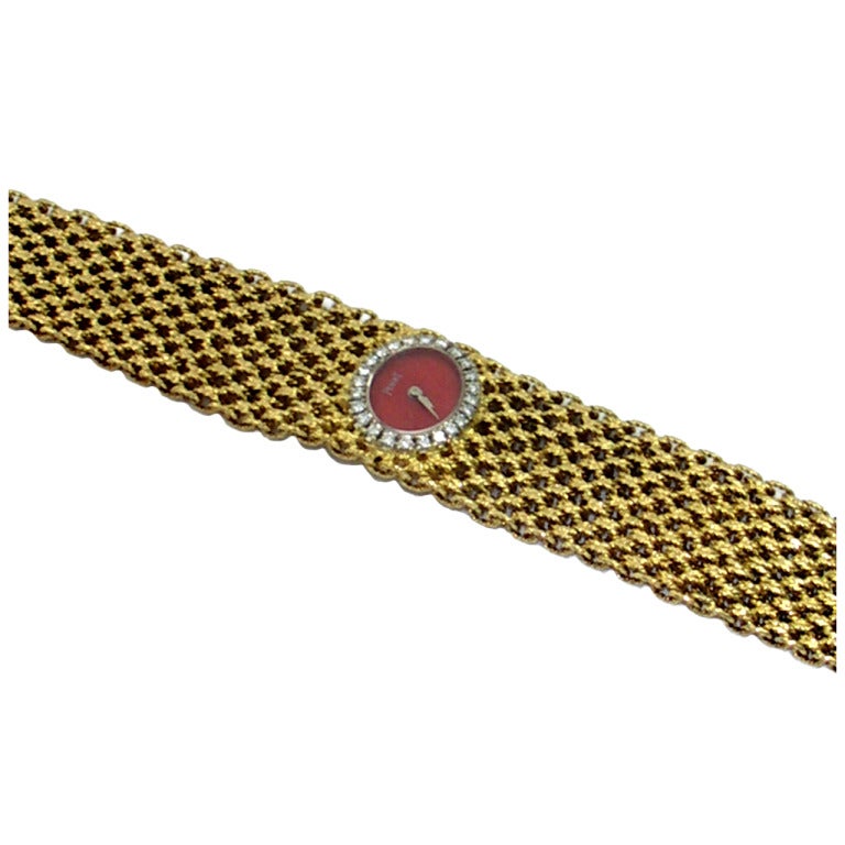 Piaget Lady's Yellow Gold Bracelet Watch with Coral Dial and Diamond Bezel
