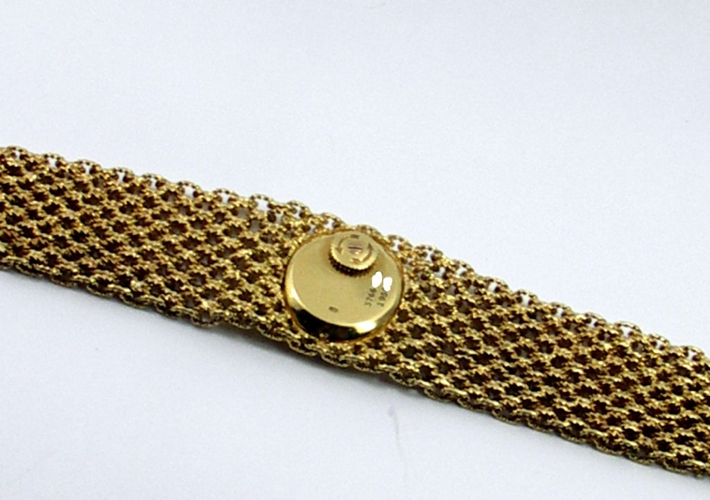 Piaget Lady's Yellow Gold Bracelet Watch with Coral Dial and Diamond Bezel In Excellent Condition In Palm Beach, FL