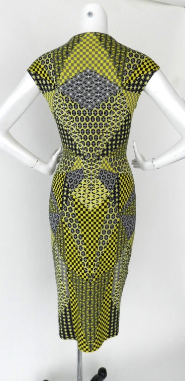 Alexander McQueen graphic dress with original paper hangtags. From the iconic Spring 2010 Plato's Atlantis collection.  Yellow, grey, black 100% cotton knit jersey stretch dress. <br />
<br />
Measurements:<br />
Tagged McQueen Size Large<br