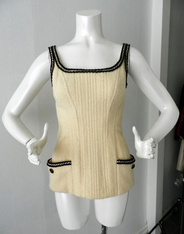Iconic Chanel 1993 spring/summer collection corset top. Claudia Schiffer wears this in the 1993 runway show and it is the first outfit shown.  She wears the same in the Chanel look book.  Excellent pristine hardly worn condition.  Made of ivory