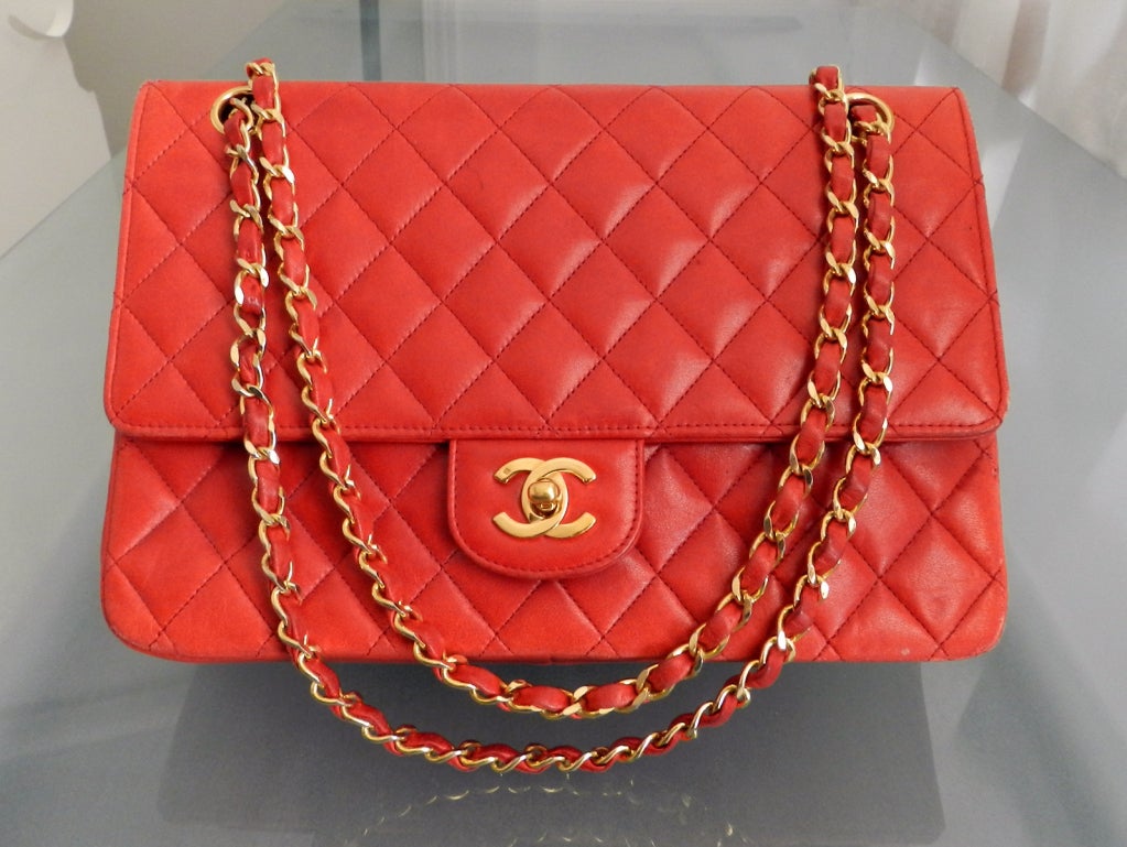 Chanel 3.55 red lambskin quilted purse with chain.