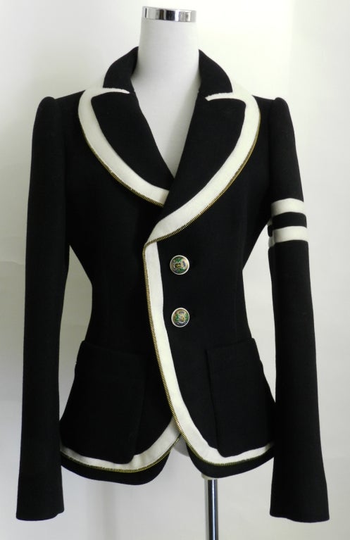 Balenciaga black wool jacket with white wool and metal zipper trim, and enamel buttons. Was part of the fall 2007 runway collection. Heavy structured wool. Interior lining has silkscreen Balenciaga logo shield design. Excellent condition as if never