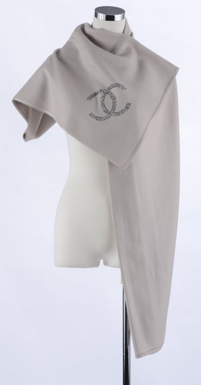 Chanel large cashmere shawl scarf. CC logo in silvertone and black metal studs. light beige colour. Excellent condition - worn once. 80
