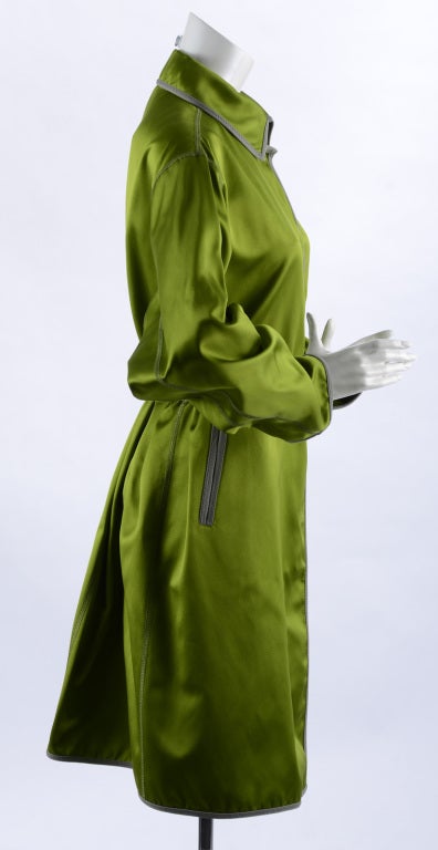 Prada green silk satin jacket / coat. Fastens with snaps, clear vinyl belt, and grey trim. Excellent condition. Tagged size Prada 40. Actual garment bust 48