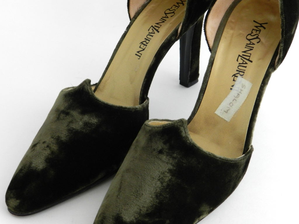 Yves Saint laurent (circa 1990's) green velvet heels. Worn on YSL runway by Shalom Harlow. Not used since. Acquired by owner from YSL himself. Runway sticker name label 'Shalom' is still on them. Size 9

Shipping quotes provided are for USA. For