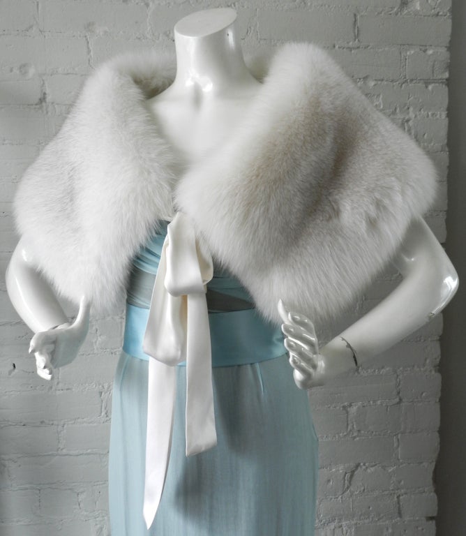 Vera Wang white fox fur stole with silk sashes. Great for a wedding. Fastens with hook and eye closure in front as well. Excellent clean condition - used only once. Free size.