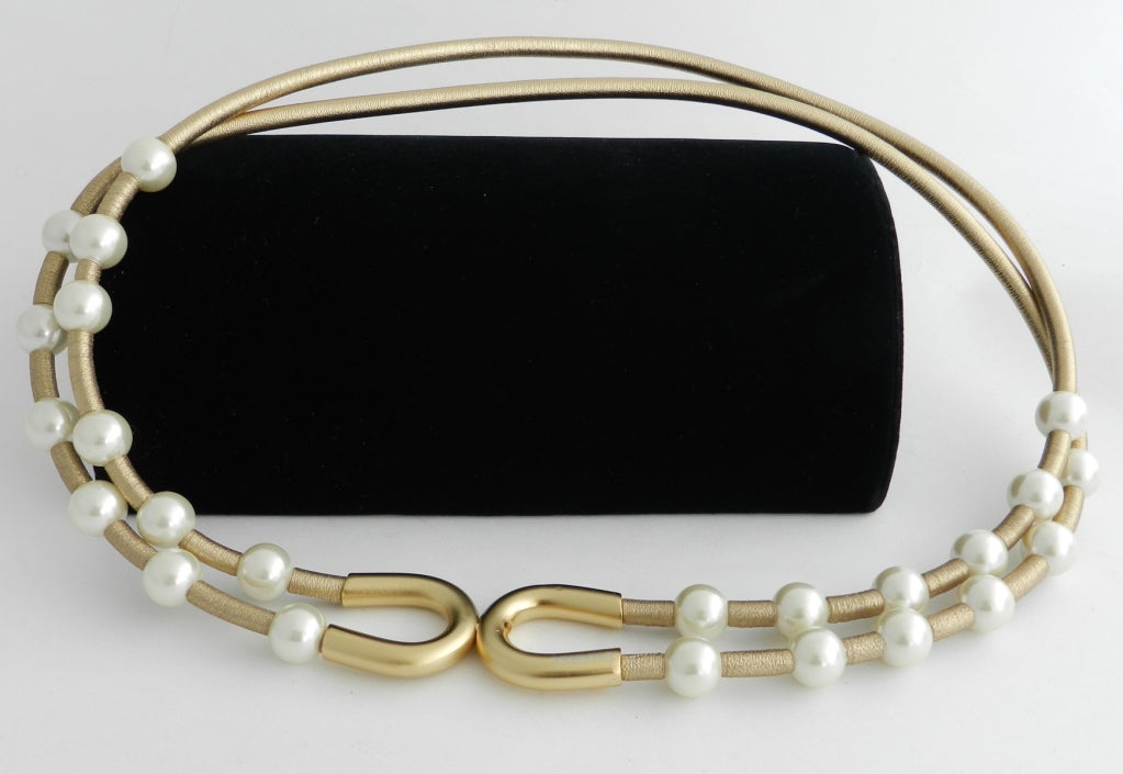 Chanel 2001 C gold lambskin leather, pearl, and matte gold metal belt in box. 29 inches. Excellent condition.