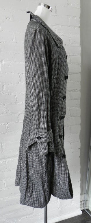Junya Watanabe Comme des Garcons fall 2007 runway coat. Unusual avant garde double layer design. Houndstooth wool. Excellent previously owned condition with no flaws. Tagged size Medium. Fits more like a size USA 4. Shoulder to shoulder seams 16