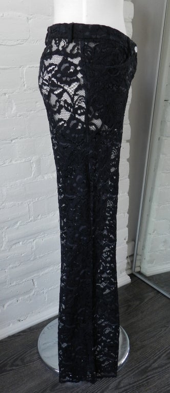 Alexander McQueen black sheer lace pants. Estimated circa late 1990's. Low rise, fitted with boot cut hem.