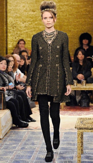 Chanel 2011 pre-fall runway collection jacket/dress.  Excellent condition - tried on once (still has original $9100+ retail price-tag in pocket). Black base with bronzy gold metallic. Square buttons with flat bronze rhinestones.  Tagged size chanel