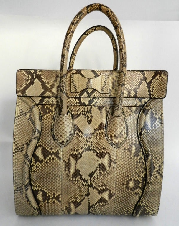 Celine mini luggage phantom tote in exotic natural python.  Size is 12 x 12 x 7 inches  not including handles. Excellent condition with no damage at corners – used once or twice. Comes with care card and duster. Circa fall 2012. Original retail