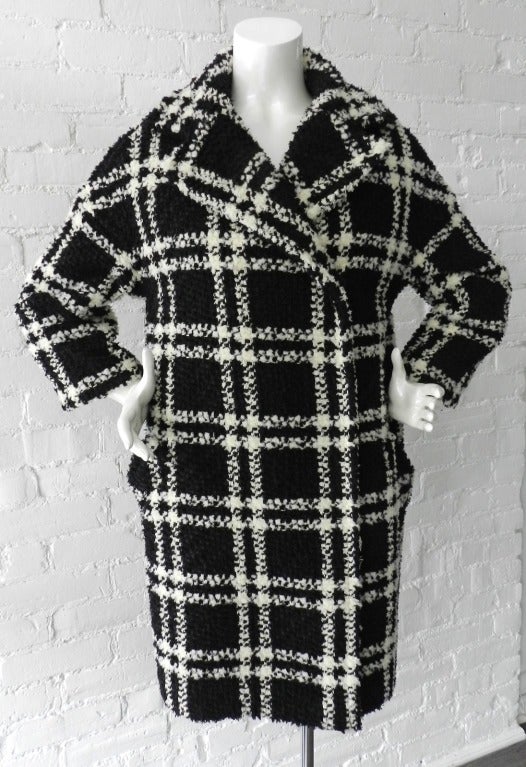 Giambattista Vali black and ivory textured wool coat.  Worn once - excellent condition. Tagged size IT 42/S (approximate USA 4/6).  2012 fall/winter.  83% wool, 17 nylon, 2 tessuto. Lined with silk.  Actual garment bust 42