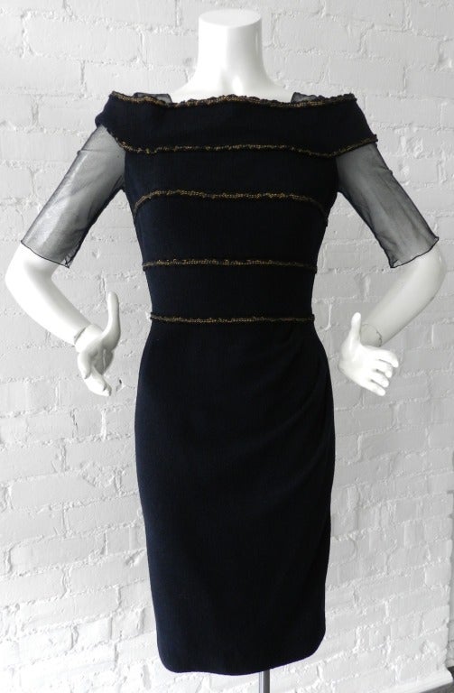 Chanel 2010 resort collection dress and matching jacket suit. Darkest midnight navy color with bronze metallic trim. Dress has sheer mesh sleeves and shoulders. Excellent condition - worn once. Tagged Chanel size 38 (USA 6). Dress to fit 35