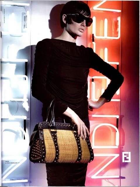 Fendi zucca runway bag designed by Karl Lagerfeld for Fendi.  This bag was limited edition from Spring 2001 runway and used in the ad campaign. Excellent condition - used lightly a few times. Black leather, copper metal studs, dark brown and black