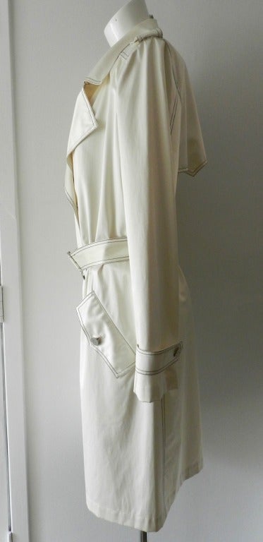 Chanel 2001 Spring trench coat. Light Spring weight with a slight sheen. 35% cotton, 35% silk, 30% spandex. Tagged size Chanel 40 (USA 8 - although this can fit a USA 10 too). Actual garment bust 42