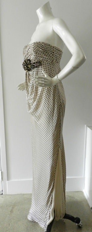 Valentino polkadot strapless silk gown. Very light pale beige color with black dots. Interior bodice has built-in bra. Side zipper, crystal embellished front, empire waist with gathered draped design at front stomach and back waist. Original retail