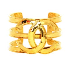 CHANEL Cutout Gold Tone Cuff With Oversized CC