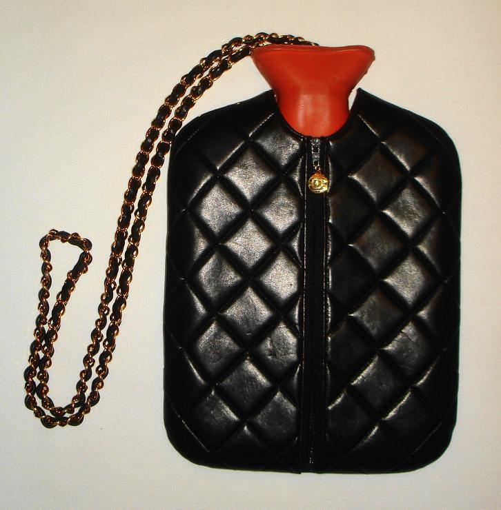 Chanel 1990s Black Quilted Lambskin Leather Hot Water Bottle Bag w Chain