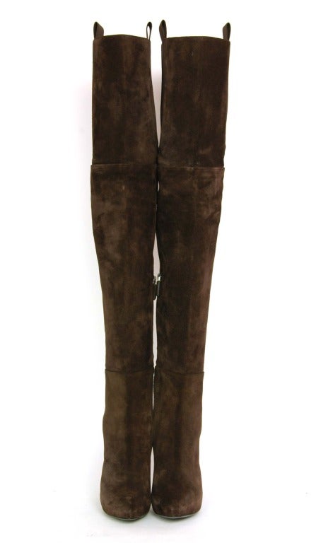 GIVENCHY New Over The Knee Hidden Platform Boot Sz. 37.5

Made In Italy
Materials: brown suede, brown elastic.
Features fitted over the knee shape with elastic and pull tabs on either side. Hidden platform and heel, pointed toe.
Stamped