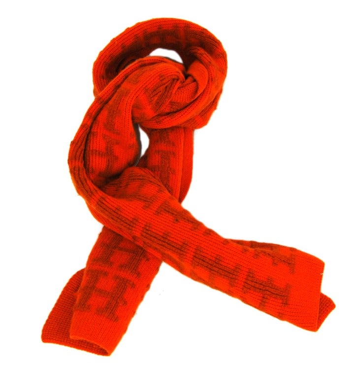 HERMES Orange Cashmere H Logo/Monogram Winter Scarf RT. $1,400+

Made in Italy
Materials: 100% cashmere
Features long, rectangular scarf with four repeating columns of Hermes H's (logo) in dark orange on a classic Hermes orange base. Unisex, can