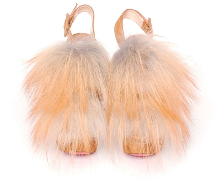 CHRISTIAN LOUBOUTIN Tan Suede Platform Heels with Fur Sz. 35.5 RT. $1,595

Made In Italy
Materials: Suede/Fur
Buckle On The Side
Retails For $1, 595

Marked Size: 35.5
US Size: 5.5
Insole: 9.25