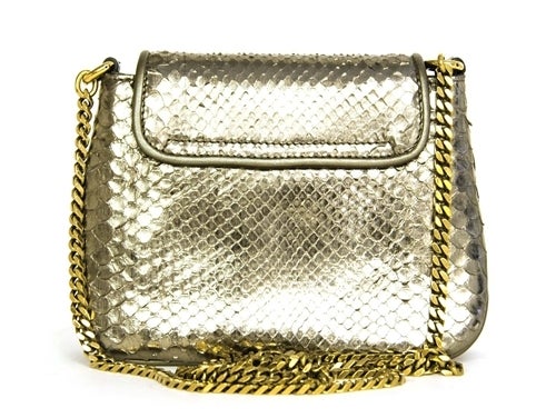 GUCCI Bronze Python '1973' Crossbody Flap Bag W. Gold Chain

Made In Italy
Material: python, gold hardware, leather lining.
Features bronze python with gold accents. Logo G's in gold on front flap, hidden snap lock closure. Mini bag with