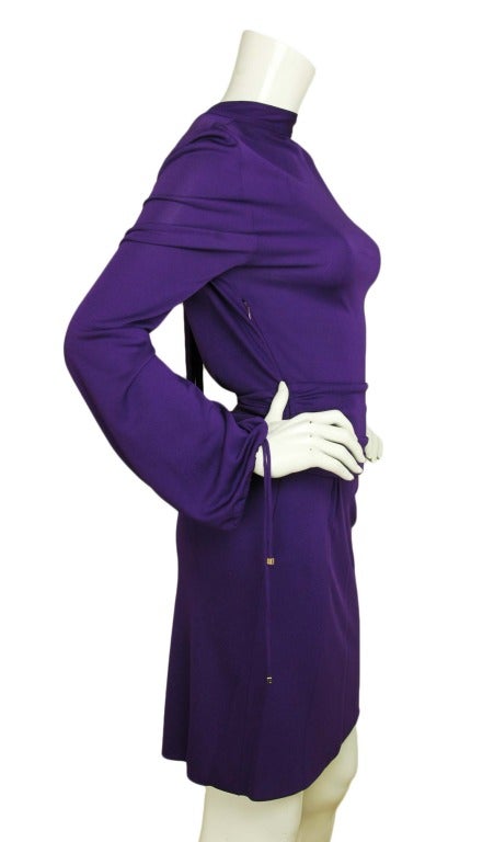 Gucci Purple Longsleeve Dress with V-Back and Fringe Chain Tie
Made in Italy
Materials; 100% viscose
Features ruched waist
Closes with side zipper

Shoulder: 16.5
