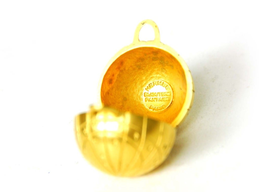 HERMES Gold Globe Necklace With Stars On Brown Leather Chain In Good Condition In New York, NY