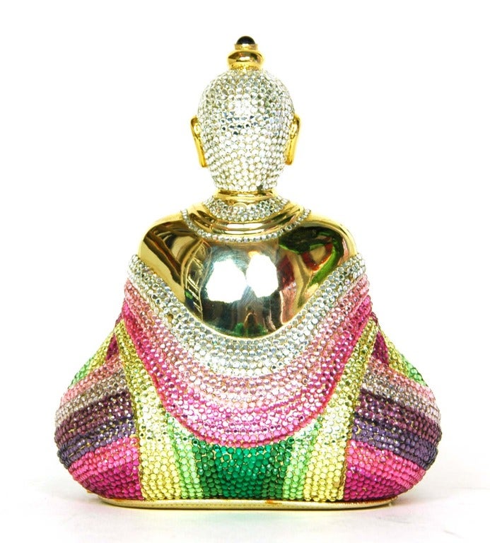 JUDITH LEIBER Gold Buddha Clutch W. Pink, Purple, Silver, Yellow & Green Swarovski Crystals & Strap
Materials: gold metal base, pink, purple, silver, yellow and green swarovski crystals, gold chain link strap, gold leather lining.
Features Buddha