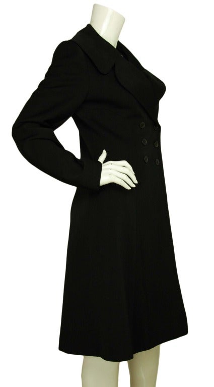 ALAIA PARIS NWT Black Button Down A-Line Coat Sz. 44
Made in France
Materials: 100% wool, 100% polyester.
Features double breasted a-line coat with double peter pan style lapels. Two rows of three buttons. 

Marked size: 44
Estimates to fit a