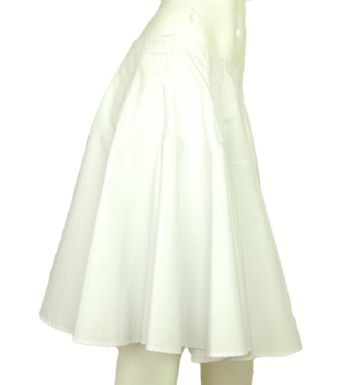 ALAIA PARIS NWT White Flared Cotton Skirt  Sz. 44
Made in France
Materials: 65% polyester, 35% cotton.
Features paneled skirt with flared bottom.

Marked size: 44
Estimated to fit a US large.
Waist: 30