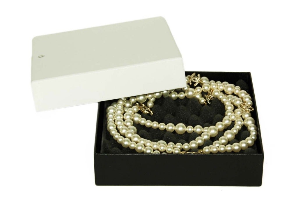 CHANEL Double Strand Pearl Necklace With Crystal CC Charms c. 2010 In Excellent Condition In New York, NY
