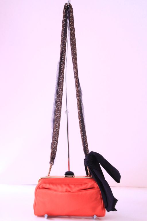 LANVIN ORANGE SATIN CLUTCH BAG W/ BLACK BOW AND CHAIN